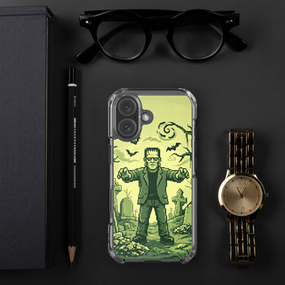 Funda transparente para iPhone® con diseño retro de Frankenstein, junto a unas gafas y un objeto decorativo.