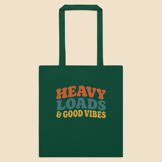 Bolsa de tela clásica en color verde botella con gráfico frontal de letras fluidas de los años 70.