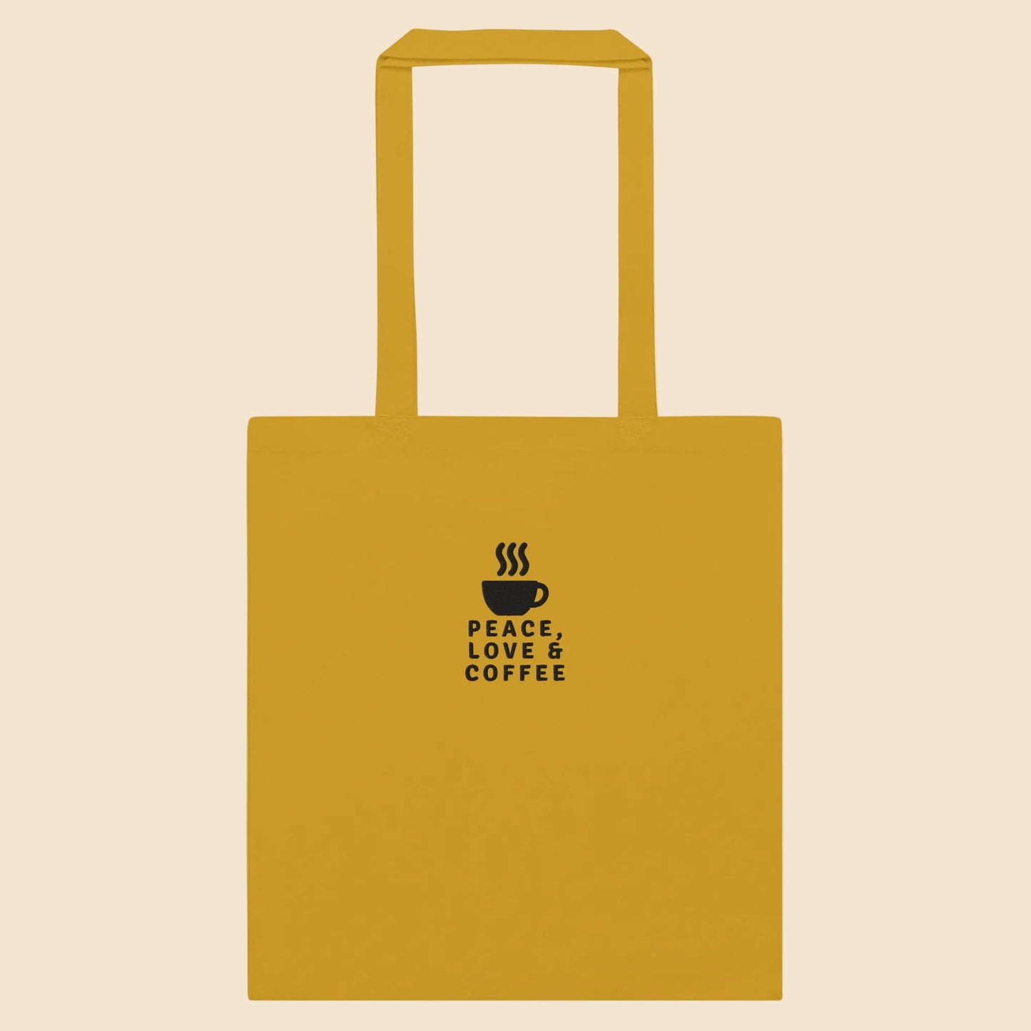 Tote bag de algodón color amarillo mostaza con estampado de taza de café en color negro.