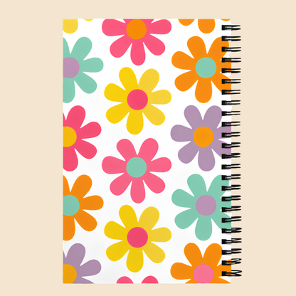 Portada completa de libreta retro con estampado floral de margaritas en colores pastel.