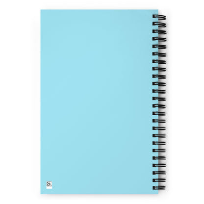 Parte trasera de libreta de espiral con diseño azul y encuadernación metálica.
