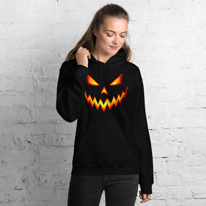 Mujer con sudadera negra con capucha y diseño de calabaza de Halloween iluminada