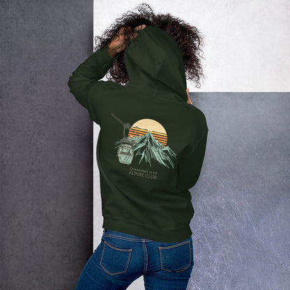  Mujer luciendo sudadera verde con gráfico clásico de club alpino.