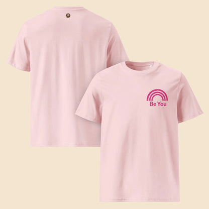 Camisetas rosa pastel con detalle de arcoíris rosa glitter en el pecho
