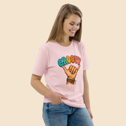 Look veraniego con camiseta rosa Groovy de algodón sostenible Melian Vintage
