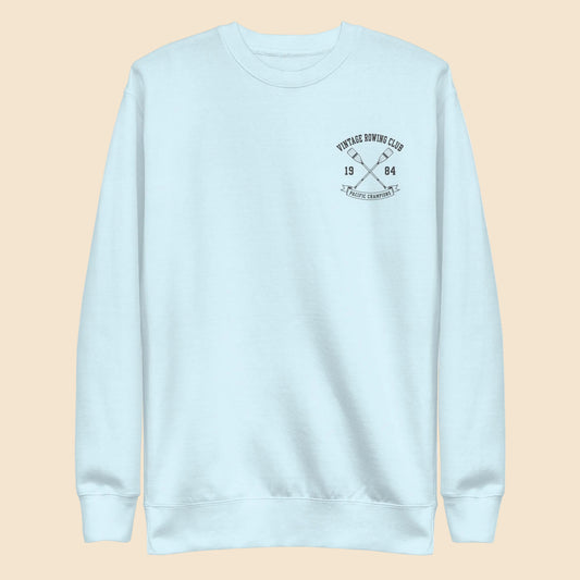 Sudadera premium de cuello redondo azul claro con diseño de club de remo Vintage Rowing Club.