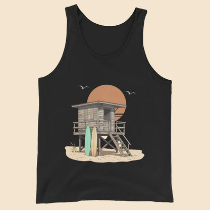 Camiseta de tirantes negra sobre superficie plana mostrando el diseño surf sunset