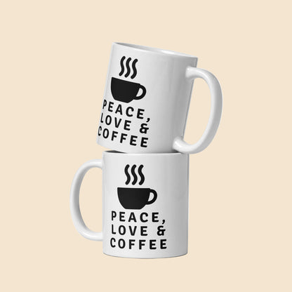 Taza de cerámica blanca brillante con diseño retro Peace Love Coffee en negro inspirada en la estética vintage de los años 70.